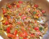 A picture of step 2 of Foul Medames with Charcoal.