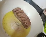 Foto del paso 2 de la receta Lomo de cerdo en salsa de papaya y naranja sobre cama de arroz