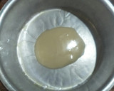 A picture of step 6 of Eggless Marble Cake.