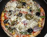 A picture of step 4 of Cheesy paneer pizza.