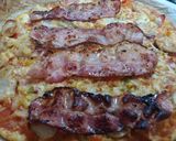 Foto del paso 4 de la receta Pizza casera Brackwurt con bacon y sofrito con curry