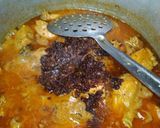A picture of step 6 of Badami chicken qorma.