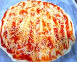 Foto del paso 3 de la receta Pizza de espinacas y queso con piñones