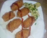 A picture of step 5 of Crispy Potatoes with stuffed rice.