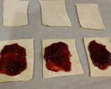 A picture of step 7 of Raspberry White Chocolate Pastry Strudels.