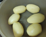 Foto del paso 11 de la receta: Palomitas de cerdo adobado en salsa de almendras y papas fritas