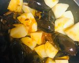 A picture of step 4 of Gravy khate alo mini bringle.