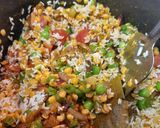 A picture of step 5 of Kathyawadi masala vegetable khichadi with masala curd, papad and 🌶.