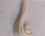 A picture of step 2 of Lachcha paratha.