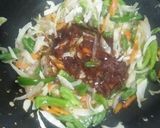 A picture of step 3 of Fried rice with chicken fried.