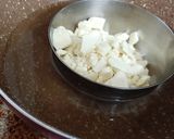 A picture of step 1 of Strawberry, Coconut stuffed White Chocolate.