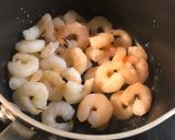 A picture of step 1 of King prawns on lentils and pistachios with avocado.