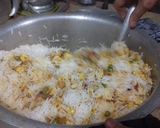 A picture of step 7 of Garlic chicken wings with chineese rice.