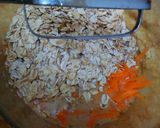 A picture of step 4 of Carrot Oatmeal Muffins with flax seeds.