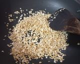 A picture of step 1 of Oats gud payasam.