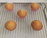A picture of step 5 of Blueberries and vanilla frosted cup cakes.
