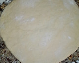 A picture of step 4 of Triangle shaped stuffed bread.