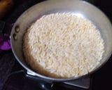 A picture of step 1 of Murmura til laddu.
