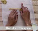 A picture of step 8 of Kaju Jalebi.