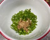 A picture of step 4 of Pork Chops with Zesty Green Onion Salsa.