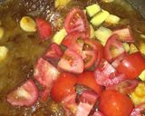 A picture of step 6 of Alu matar gravy.