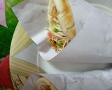 A picture of step 8 of Chicken Tikka shawarma.