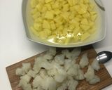 Foto del passaggio 1 della ricetta Paccheri ripieni di crema di patate e baccalà, su fonduta dì parmigiano