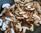 A picture of step 2 of Black rice shiitake mushroom risotto.