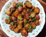 A picture of step 11 of ALOO DO PYAZA..