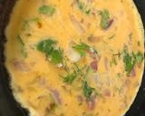 A picture of step 5 of Omelette-roti sandwich.