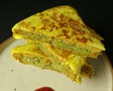 A picture of step 4 of Stuffed Bread Omelette Sandwich.