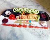 A picture of step 7 of Cucumber snail or chain...And flower salad.