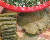 A picture of step 3 of Stuffed Grape Leaves with Vegetables (also known as Yabraq, Yalanji, or Dolma, names vary by country).