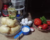 Foto del paso 1 de la receta: Tortitas de papa en salsa de tomate rojo