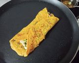 A picture of step 7 of Paneer Stuffed Besan Chilla.