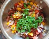 A picture of step 2 of Mango salsa dip with nachos.