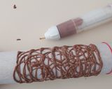 Foto del passaggio 5 della ricetta Pignoccata siciliana su cialda di cioccolato