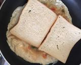 A picture of step 3 of Bread in egg toast.