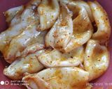 A picture of step 1 of Chicken stuffed squid.