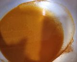 A picture of step 2 of Turmeric rice and fish sauce.
