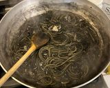 A picture of step 5 of One-Pan Spaghetti with Squid Ink and Lemon.