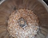 A picture of step 3 of Penne Pasta in cheesy oats white sauce.