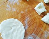 Foto del passaggio 5 della ricetta Bomboloni ripieni di crema pasticcera e al cioccolato