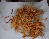 A picture of step 6 of Crispy brown onions.