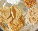 A picture of step 9 of Halwa, Poori, and Kheer.
