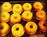 A picture of step 5 of Baked Glazed Donuts.