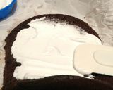 A picture of step 6 of 5 minute cake in frying pan(Swiss roll).