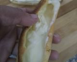 A picture of step 11 of Choco orange eclair with fresh cream...cup of hot chocolate.