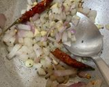 A picture of step 2 of Drumstick leaves with sun dried lentil dumplings.