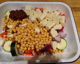 A picture of step 2 of Roasted Harrissa veggies with halloumi and chickpeas.